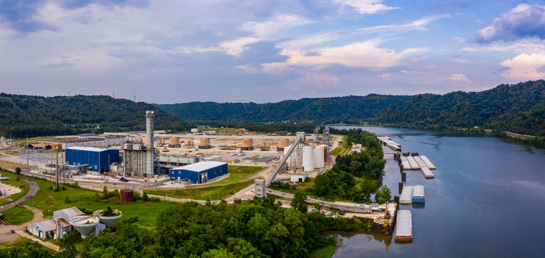 Power plant aerial view – looking east, showing Ohio River infrastructure and sand barge operations