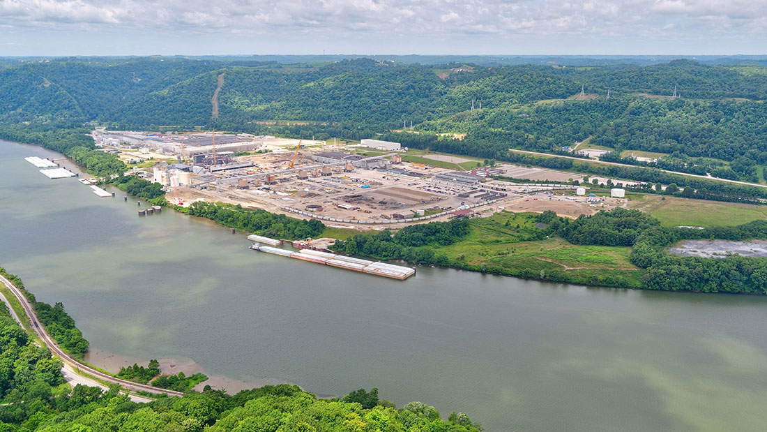 Site overview during power plant construction, looking northeast